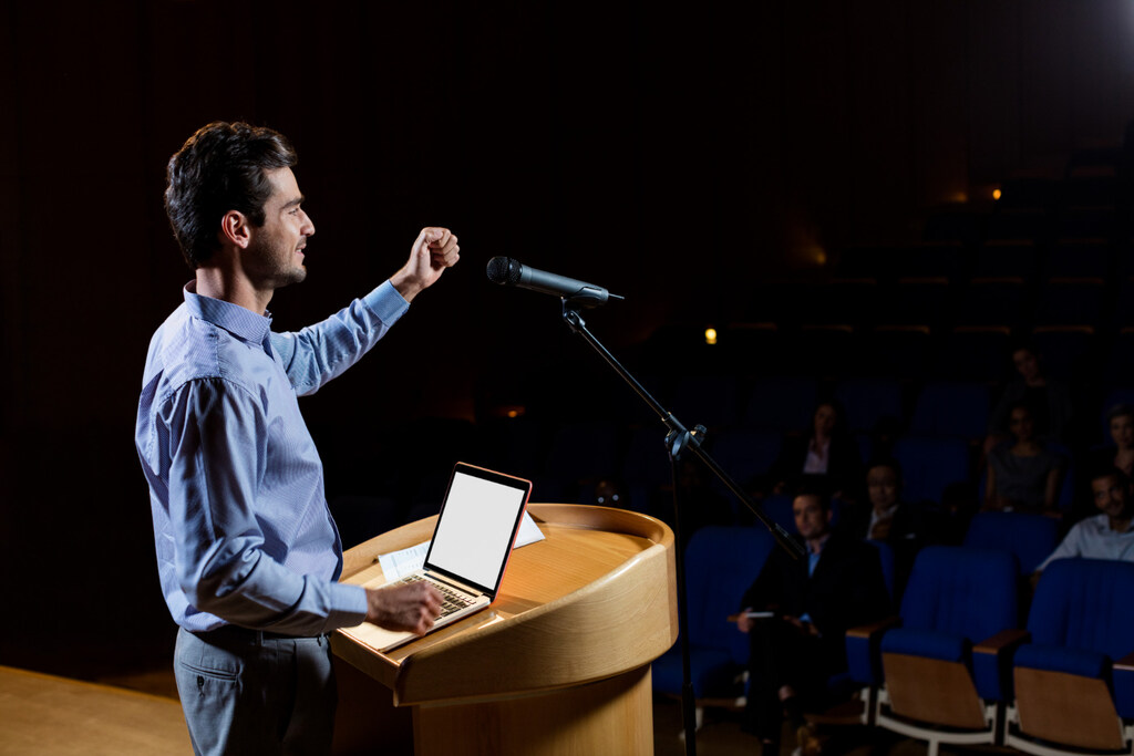 Keynote speaking in front of audience